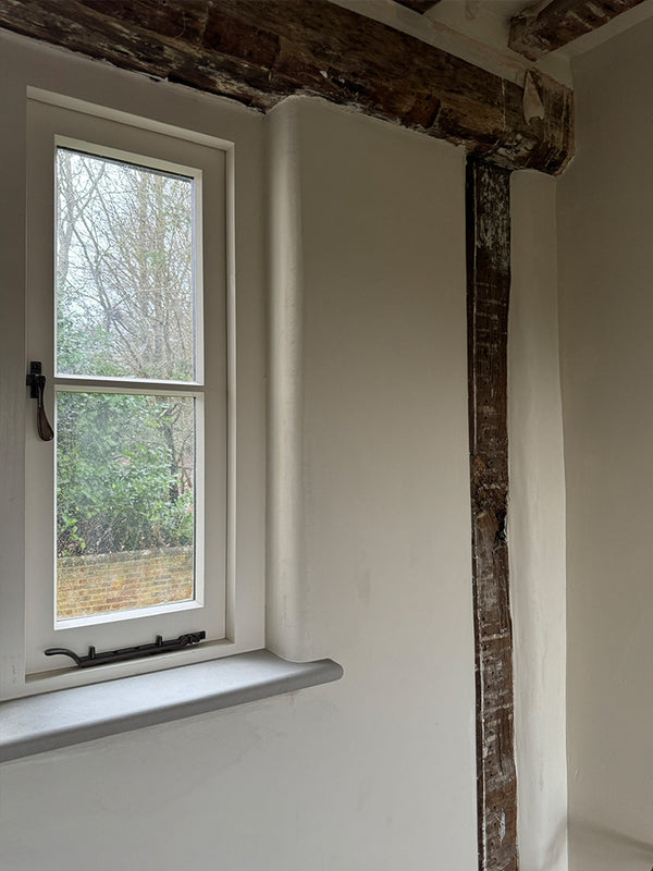 Maidstone - lime plastering, bullnose Caesarstone windowsills, bronze ironmongery and first coat of Farrow & Ball Schoolhouse White