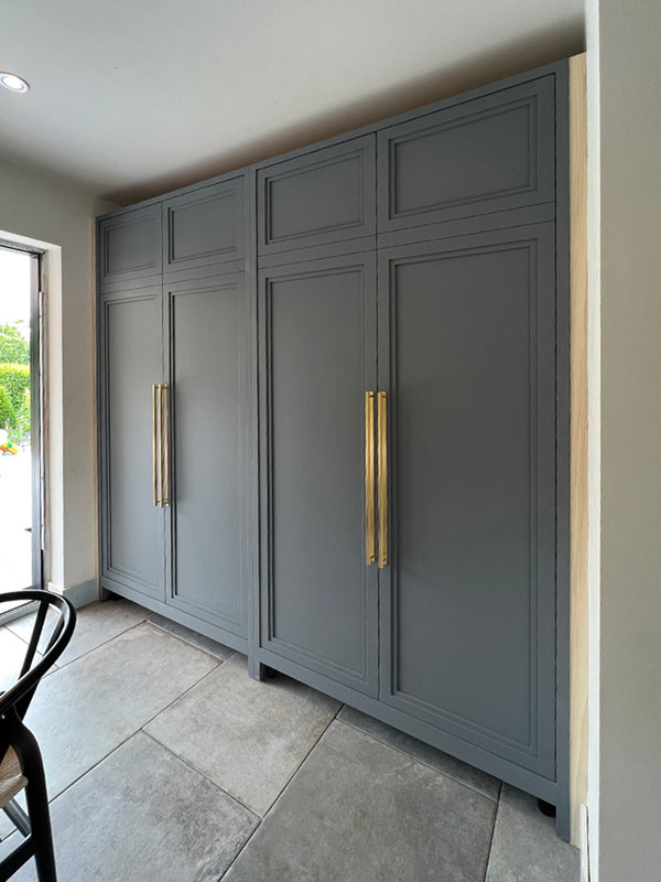 Fusion by Fawn - Hove kitchen larder units, with contemporary multi-layered design, being installed. This is just the primer, they will be a rich blue-black