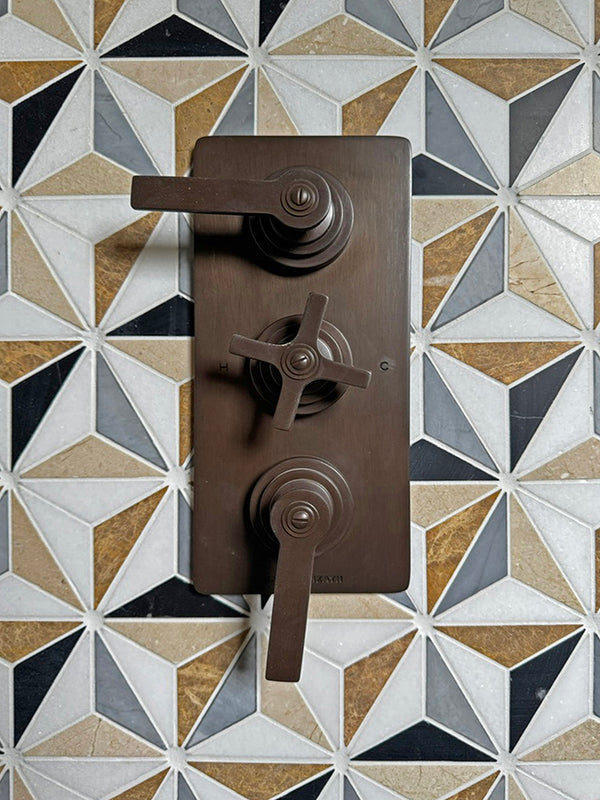 Samuel Heath shower valve on marble Artisans of Devizes mosaic tiles