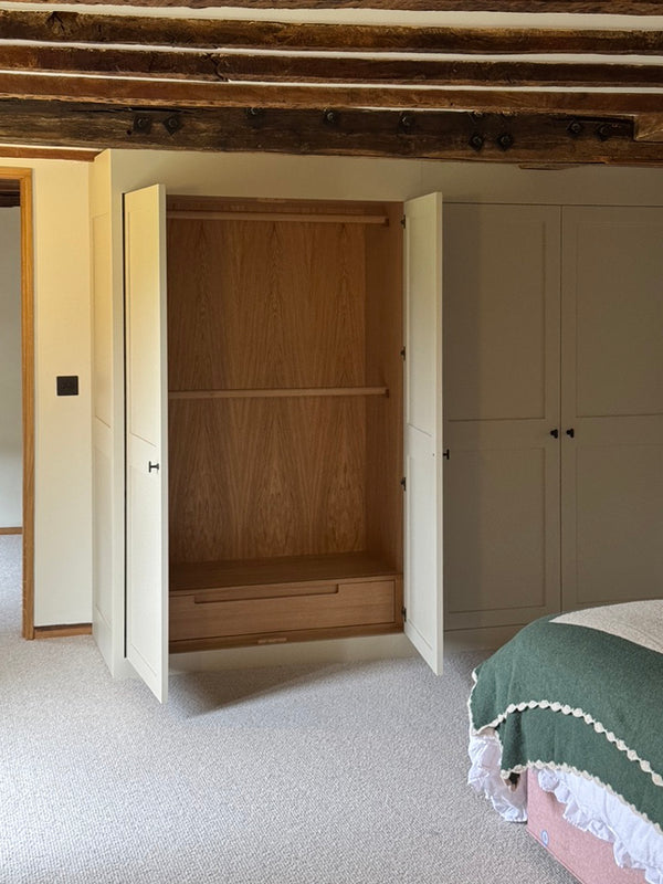 Maidstone - the internal of this double wardrobe features two oak hanging rails and internal solid oak drawer