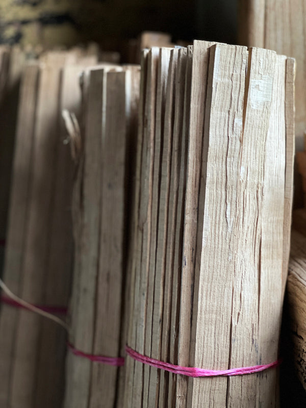 Bundles of oak lath ready for traditional lath and lime plastering