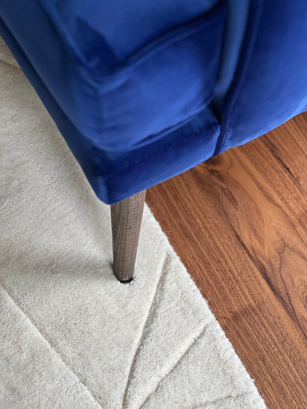 Andover - layers of textural loveliness; walnut floors, wool carpet, velvet sofa